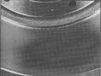Greased-stained brake drum.