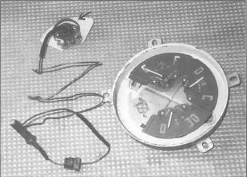 Here is an instrument cluster from a 1950 Chev truck.  the top arch on the back of temperature gauge is the Bourdon Tube (arrow).  while this guage still works, it has a 50 year headstart on kinking the capillary tube. handle gently.  Decal kits are available to renew cosmetics.