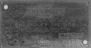 Rubbing the identification plate makes the number, 2HC08 9462, more legible.